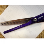 Jaguar Pastall Plus "Purple" 5" 40 tooth White Line Comfort class thinner or texturing scissor.